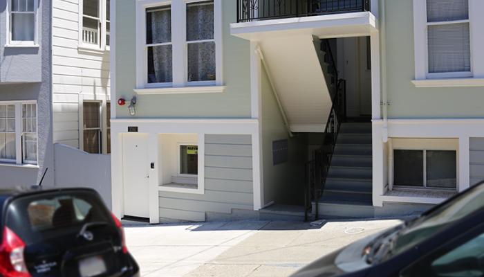 A modified garage turned into additional unit of apartment building on Jones Street.