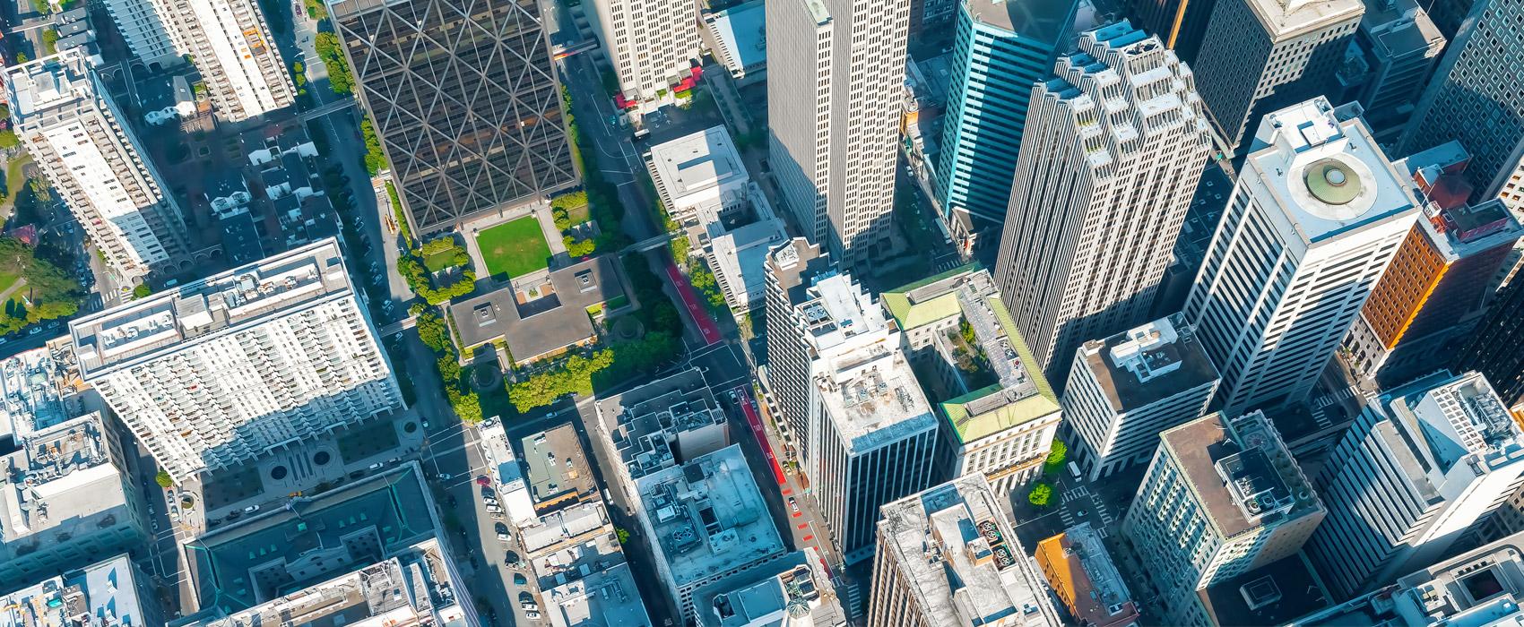 Overhead aerial view of downtown office buildings.