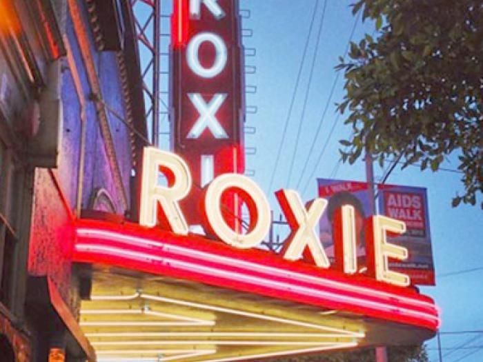 neon signage of the Roxy Theater