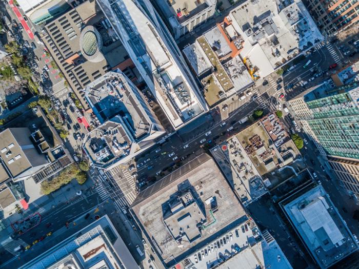 n aerial birds eye view of San Francisco looking straight down at the skyscrapers and streets in the financial district.