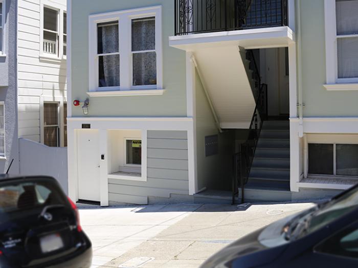 A modified garage turned into additional unit of apartment building on Jones Street.